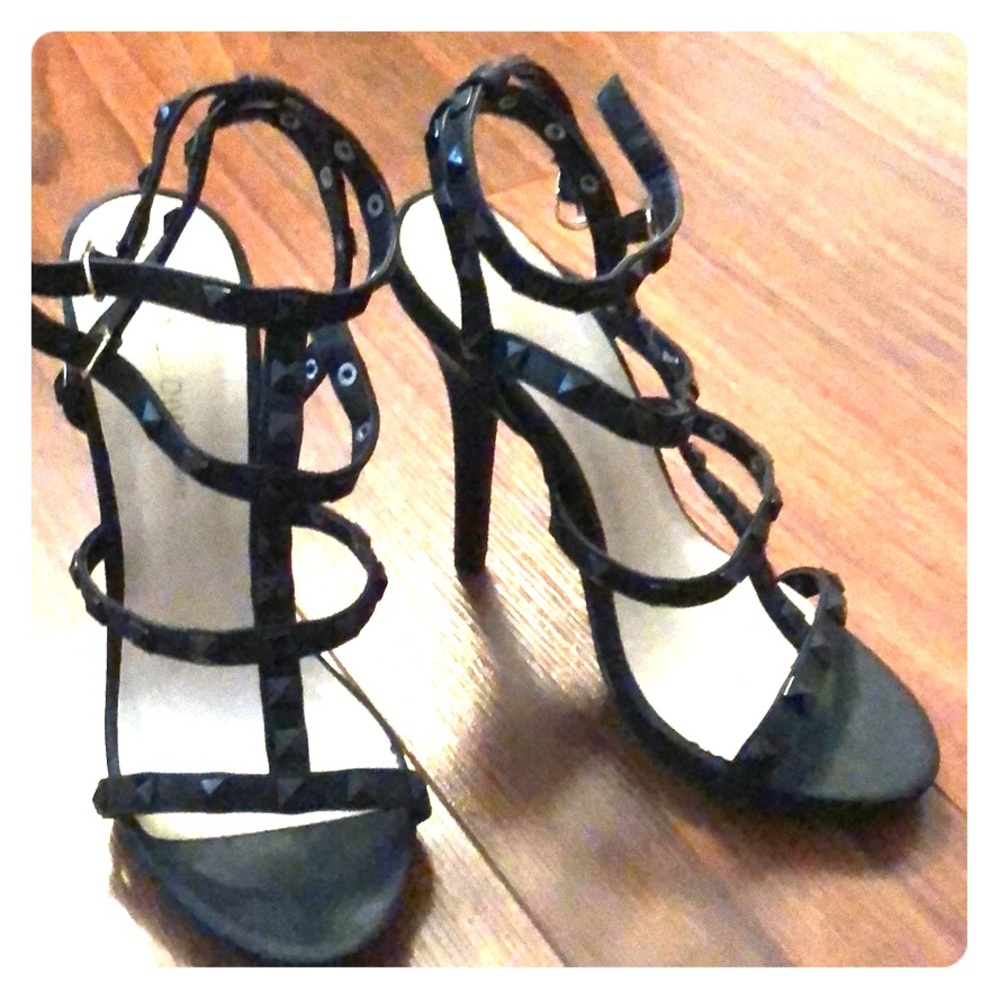 Black studded pumps